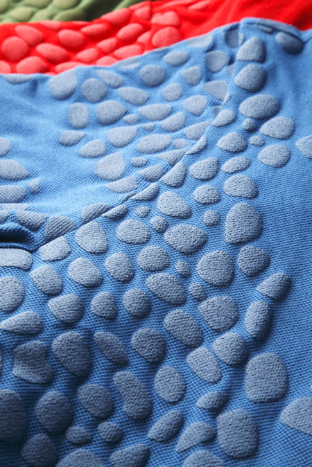 04-plastic-polo-mens-detail.jpg