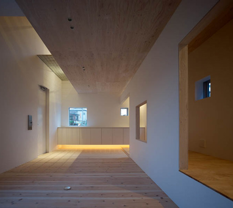 Small House with big Spiral Staircase by Hideshi Abe
