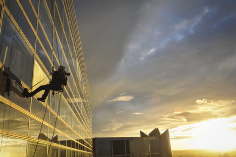 Abseiling architectural photography by Carlos Ayesta