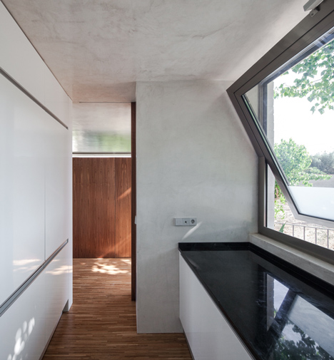 House on a Warehouse by Miguel Marcelino