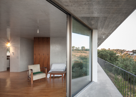 House on a Warehouse by Miguel Marcelino