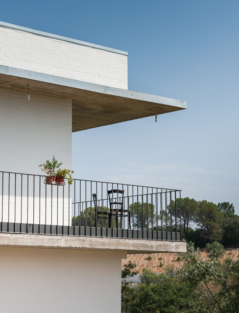 House on a Warehouse by Miguel Marcelino
