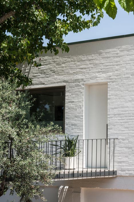 House on a Warehouse by Miguel Marcelino