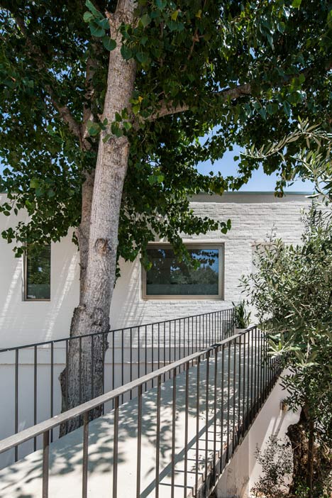 House on a Warehouse by Miguel Marcelino
