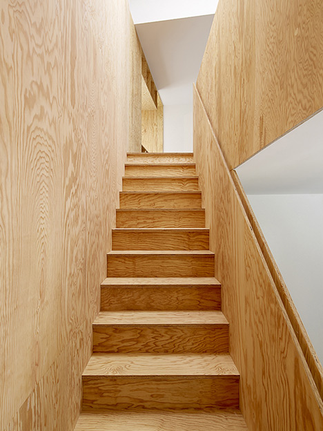 Apartment interiors with boxy wooden furniture by Big-Game