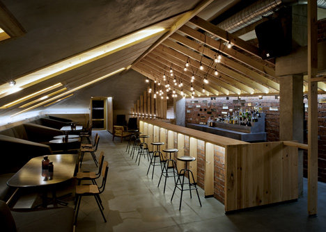 Bar in an attic space in Minsk by Inblum Architects