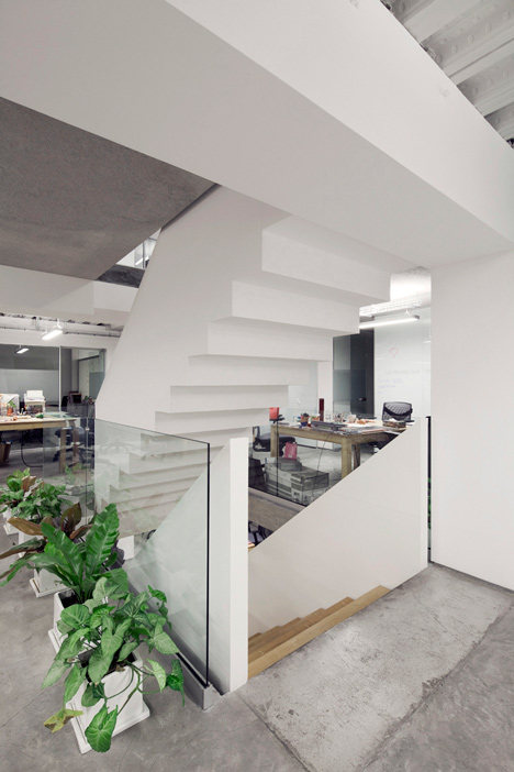 Office in Mexico that centres around its staircase