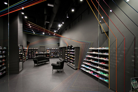 Run Colors trainers store by Modelina Architekci