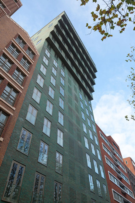 Turquoise tower by NL Architects that staggers back to create sunny balconies