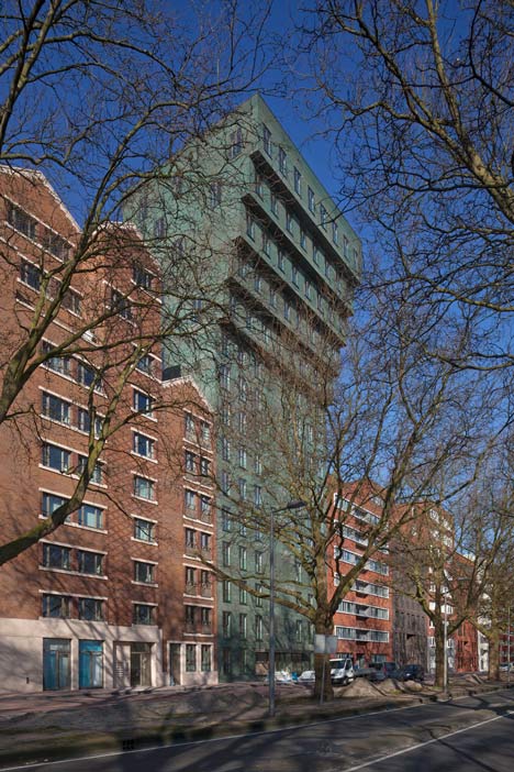 Turquoise tower by NL Architects that staggers back to create sunny balconies