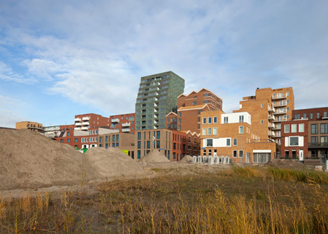 Turquoise tower by NL Architects that staggers back to create sunny balconies