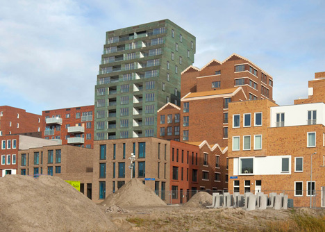 Turquoise tower by NL Architects that staggers back to create sunny balconies