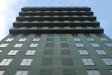 Turquoise tower by NL Architects that staggers back to create sunny balconies