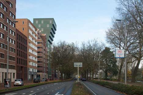 Turquoise tower by NL Architects that staggers back to create sunny balconies