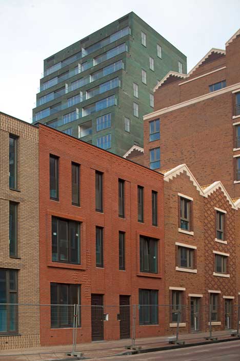 Turquoise tower by NL Architects that staggers back to create sunny balconies