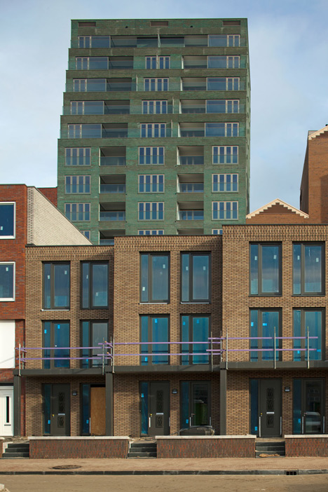 Turquoise tower by NL Architects that staggers back to create sunny balconies
