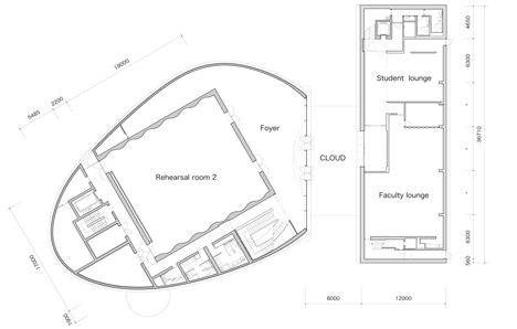 First floor plan of Blob-shaped silver building contrasts with a red tower at Japanese music college