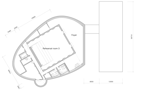 Basement plan of Blob-shaped silver building contrasts with a red tower at Japanese music college