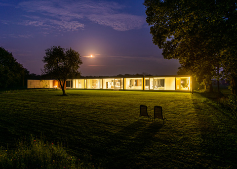 Dutch studio Inbo hides a transparent house behind a grove of trees