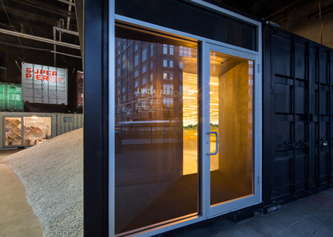 Golden girders protrude from piles of gravel to display sunglasses