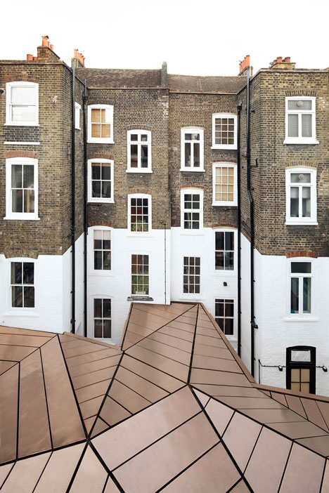 Great James Street Office extension with a faceted copper roof by Emrys Architects
