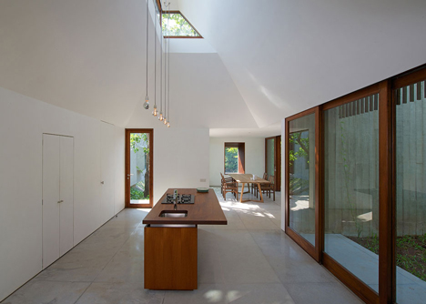 House on a stream by Architecture Brio