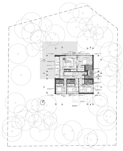 Ground floor plan of Timber-clad seaside house with a grainy concrete interior by Ultra Architects