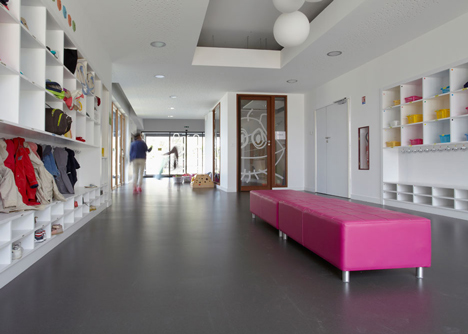 Timber-clad kindergarten in France by Topos Architecture