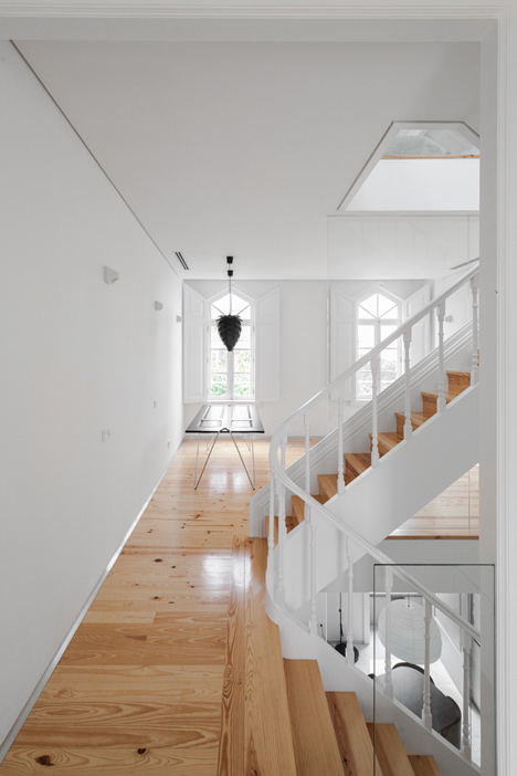 Portuguese townhouse meets Alpine chalet at this renovation by Tiago do Vale Arquitectos