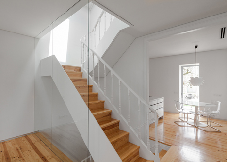 Portuguese townhouse meets Alpine chalet at this renovation by Tiago do Vale Arquitectos
