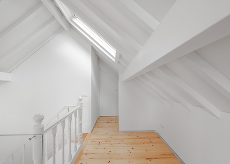 Portuguese townhouse meets Alpine chalet at this renovation by Tiago do Vale Arquitectos