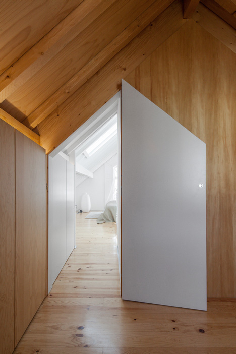 Portuguese townhouse meets Alpine chalet at this renovation by Tiago do Vale Arquitectos