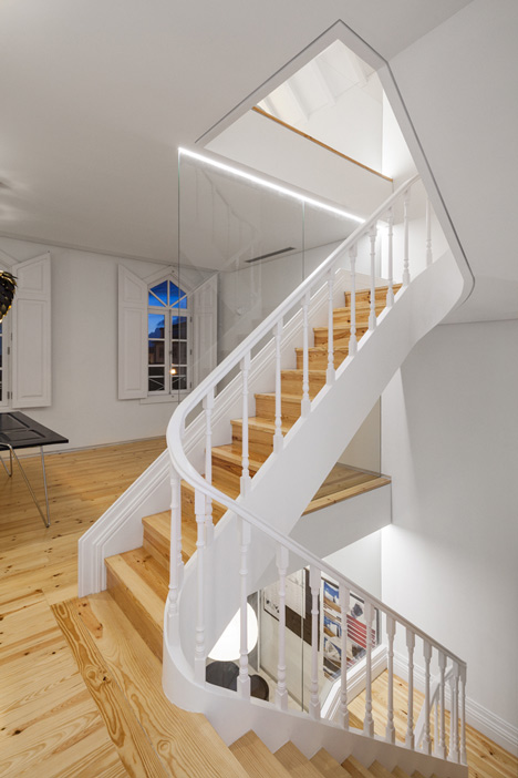 Portuguese townhouse meets Alpine chalet at this renovation by Tiago do Vale Arquitectos