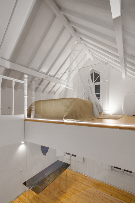 Portuguese townhouse meets Alpine chalet at this renovation by Tiago do Vale Arquitectos