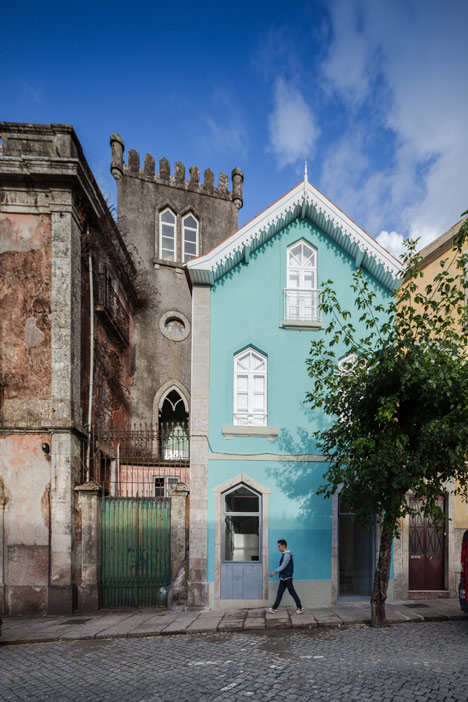 Portuguese townhouse meets Alpine chalet at this renovation by Tiago do Vale Arquitectos