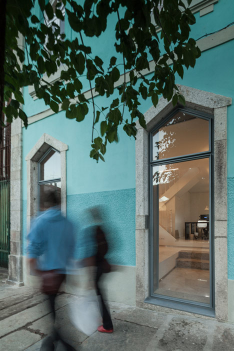 Portuguese townhouse meets Alpine chalet at this renovation by Tiago do Vale Arquitectos