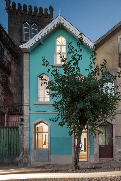 Portuguese townhouse meets Alpine chalet at this renovation by Tiago do Vale Arquitectos