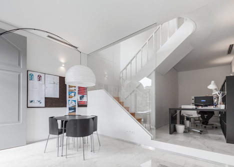 Portuguese townhouse meets Alpine chalet at this renovation by Tiago do Vale Arquitectos