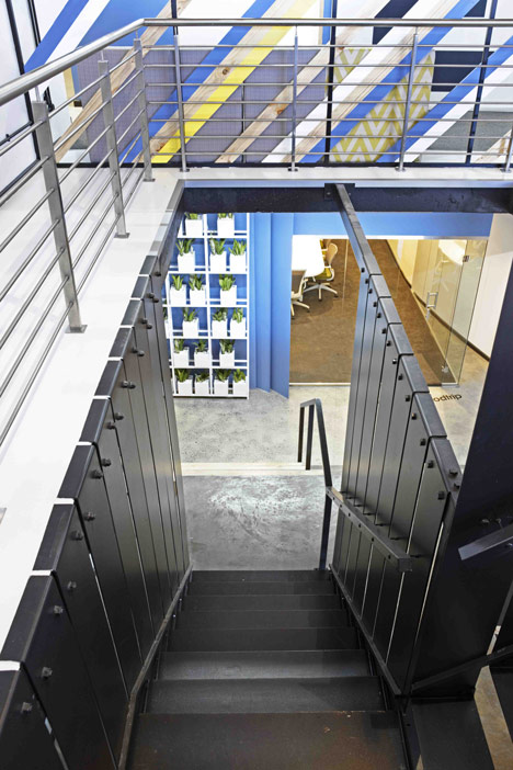 99c offices by Inhouse Brand Architects features<br /> a waiting room inside a shipping container
