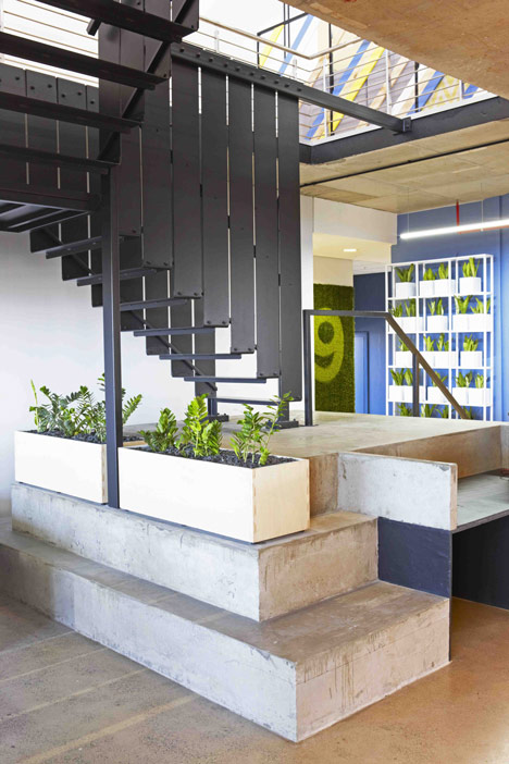 99c offices by Inhouse Brand Architects features<br /> a waiting room inside a shipping container