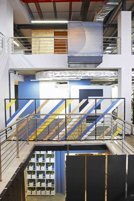 99c offices by Inhouse Brand Architects features<br /> a waiting room inside a shipping container