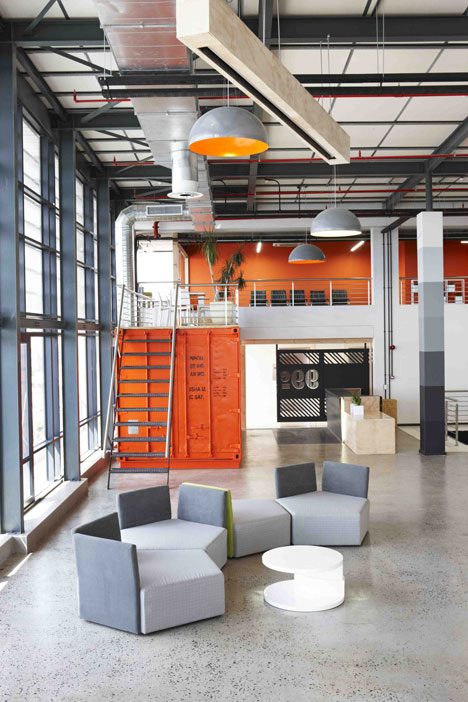 99c offices by Inhouse Brand Architects features<br /> a waiting room inside a shipping container