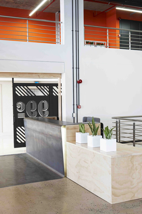 99c offices by Inhouse Brand Architects features<br /> a waiting room inside a shipping container