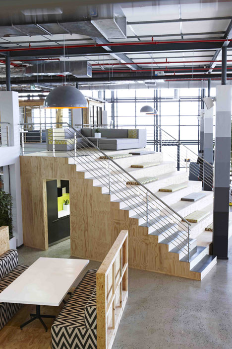 99c offices by Inhouse Brand Architects features<br /> a waiting room inside a shipping container
