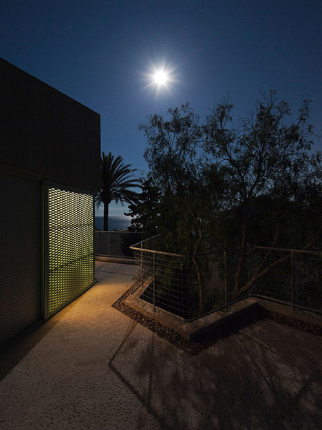 Concrete house by Langarita-Navarro photographed as a crime scene