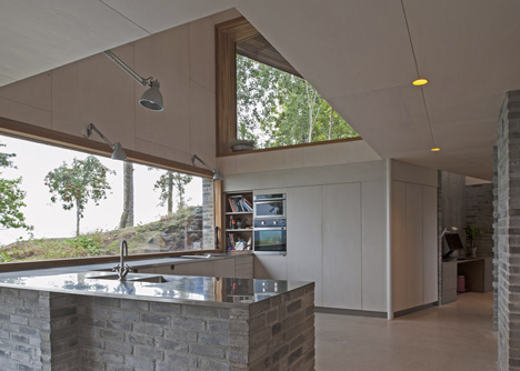 Double-gabled house overlooking a Norwegian fjord by Schjelderup Trondahl Architects