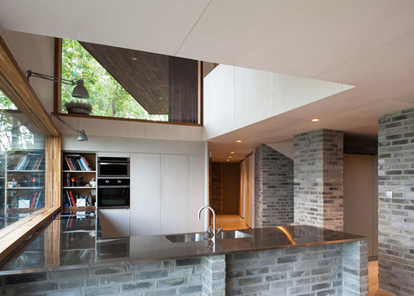 Double-gabled house overlooking a Norwegian fjord by Schjelderup Trondahl Architects