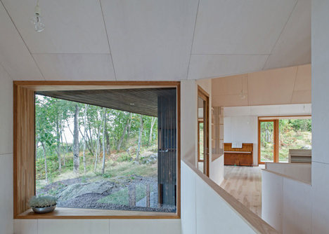 Double-gabled house overlooking a Norwegian fjord by Schjelderup Trondahl Architects