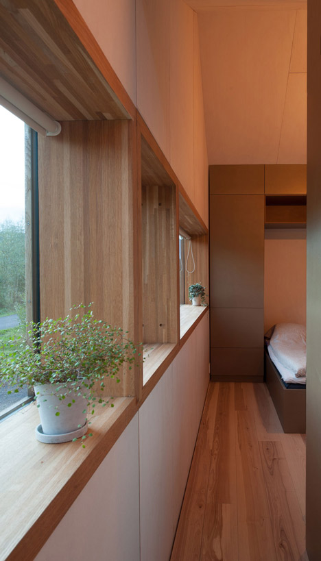 Double-gabled house overlooking a Norwegian fjord by Schjelderup Trondahl Architects