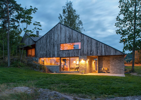 Double-gabled house overlooking a Norwegian fjord by Schjelderup Trondahl Architects